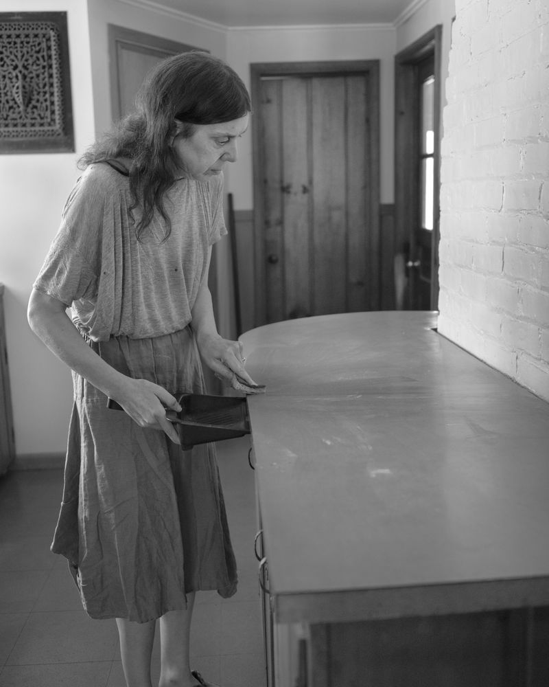 © Ruth Lauer-Manenti - Self Portrait with a Dustpan, archival pigment print 15" x 12", gelatin silver print 5" x 4"