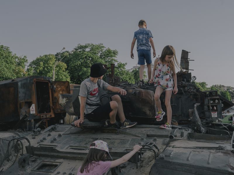 © Fabian Ritter - Children play on destroyed Russian war equipment in front of St. Michael‘s Monastery in Kyiv on June 12, 2022