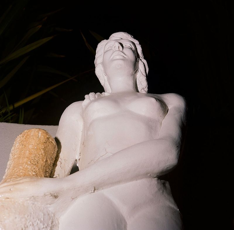© Marissa Leitman - Statue of a woman overlooking an estate in Hollywood.