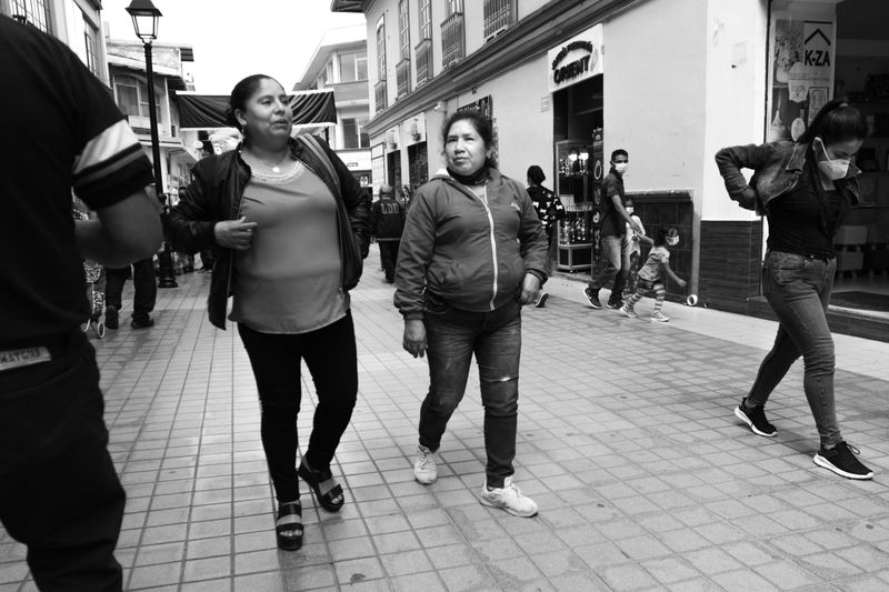 © Ahimsa - Two women walk through the city without masks on a Tuesday. February 2021. Loja - Ecuador.