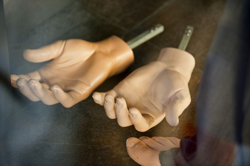 © Steven Edson - Store mannequin hands and foot in window of store in Charleston, SC