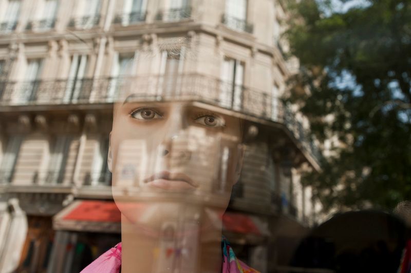 © Steven Edson - Store mannequins in window in Paris France