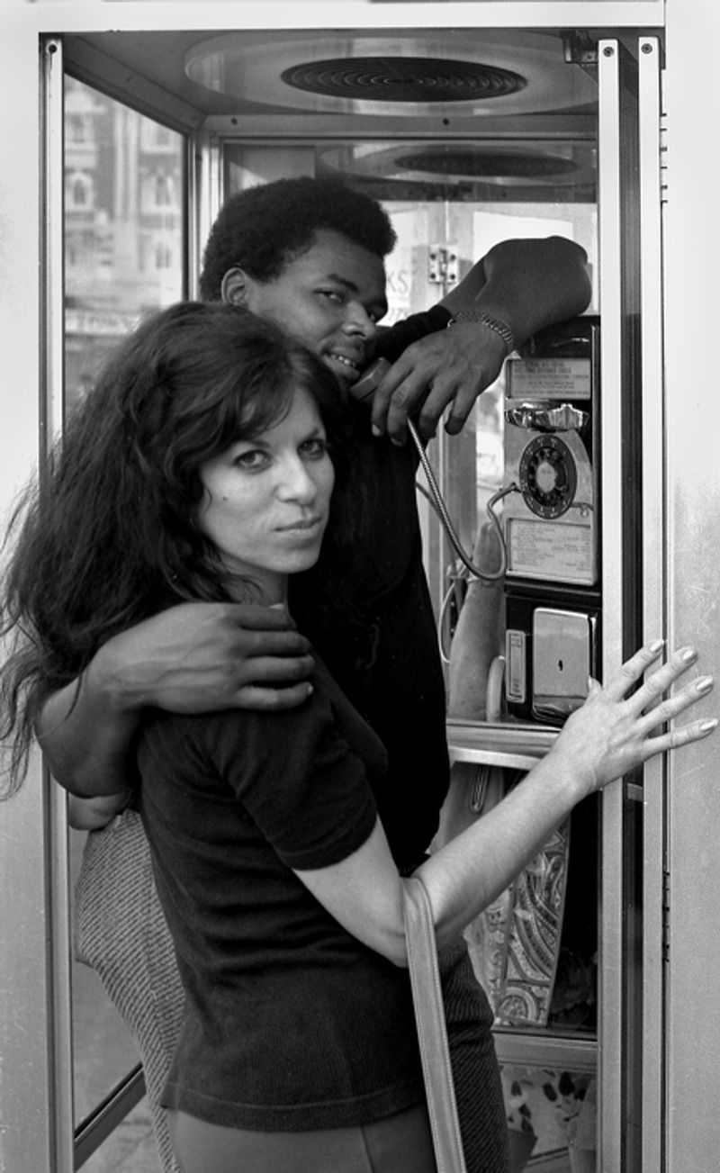 © Steven Edson - Couple in telephone booth. NYC, NY