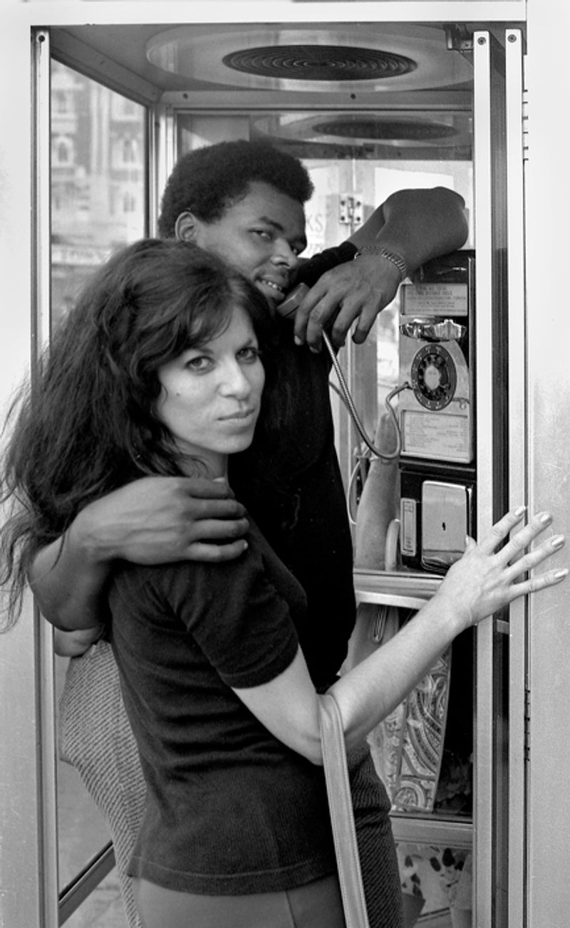 © Steven Edson - Couple in telephone booth. NYC, NY