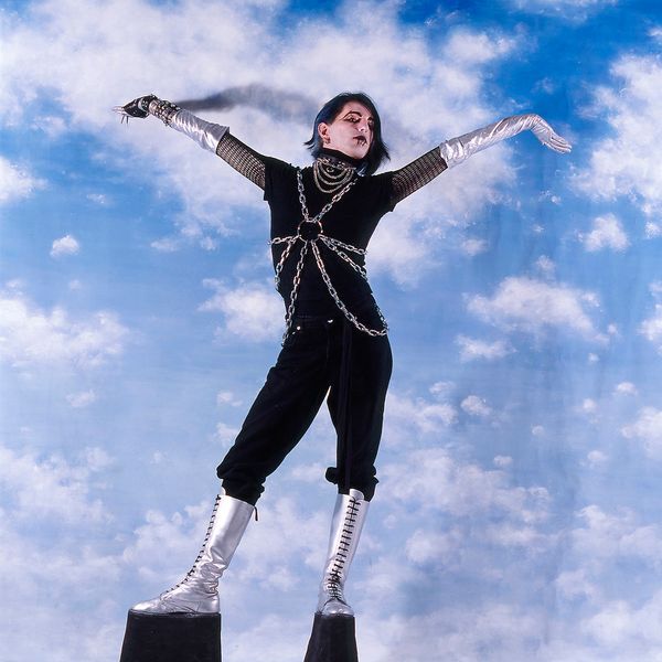 © Steven Edson - Young man dressed in Goth clothing wearing very high platform shoes