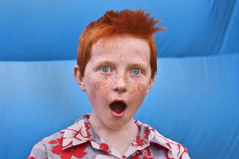 © Steven Edson - Boy with red hair.