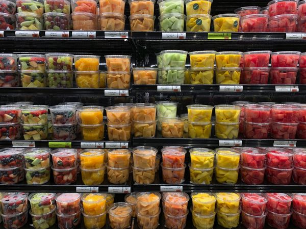 © Steven Edson - Fresh cut fruit in clear plastic containers