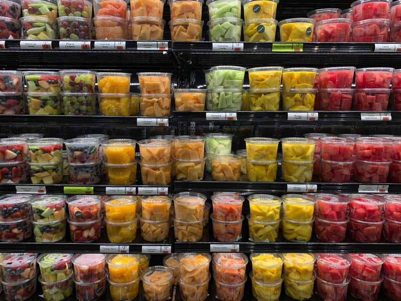 © Steven Edson - Fresh cut fruit in clear plastic containers