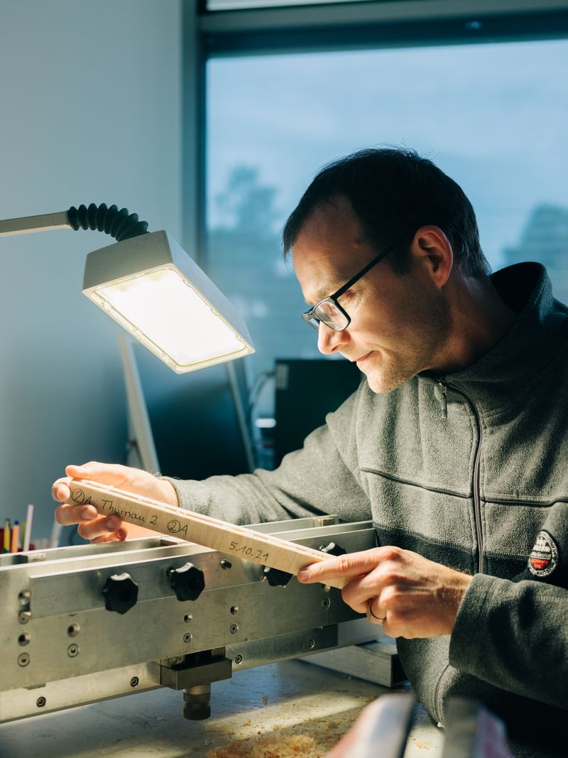 © Jan Richard Heinicke - Dr. Alexander Land examines tree rings in his laboratory at the University of Hohenheim.