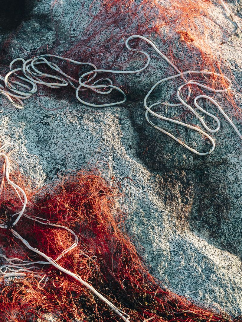 © Jan Richard Heinicke - Fishing nets drying in the harbor of Narsaq.