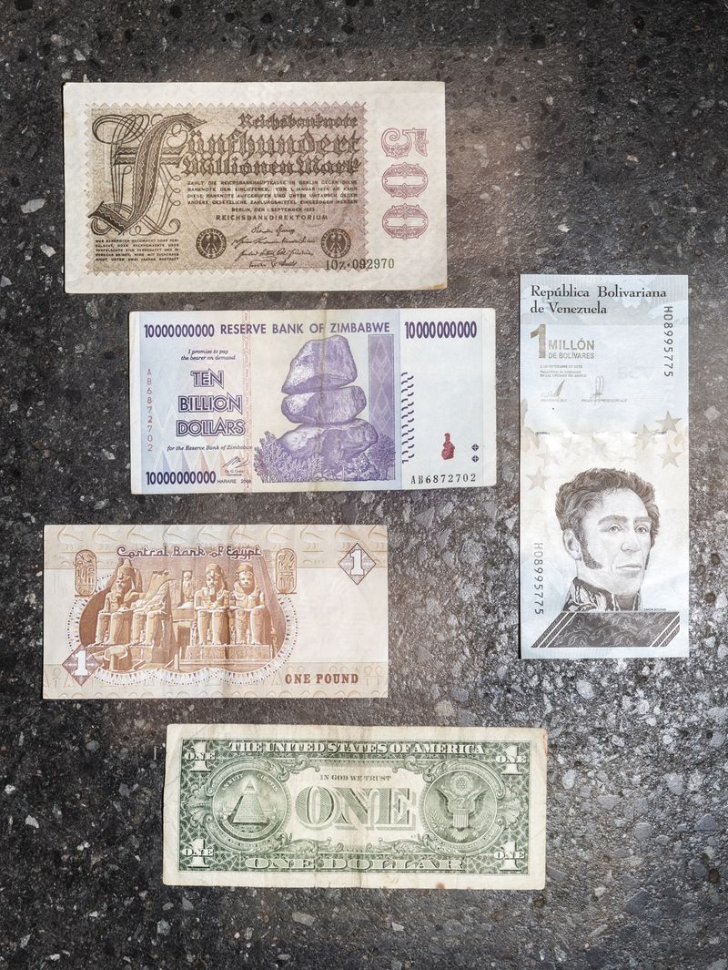 © Enka Springub - Banknotes from hyperinflationary currencies from the German Reich, Zimbabwe, Egypt, Venezuela, and the United States.