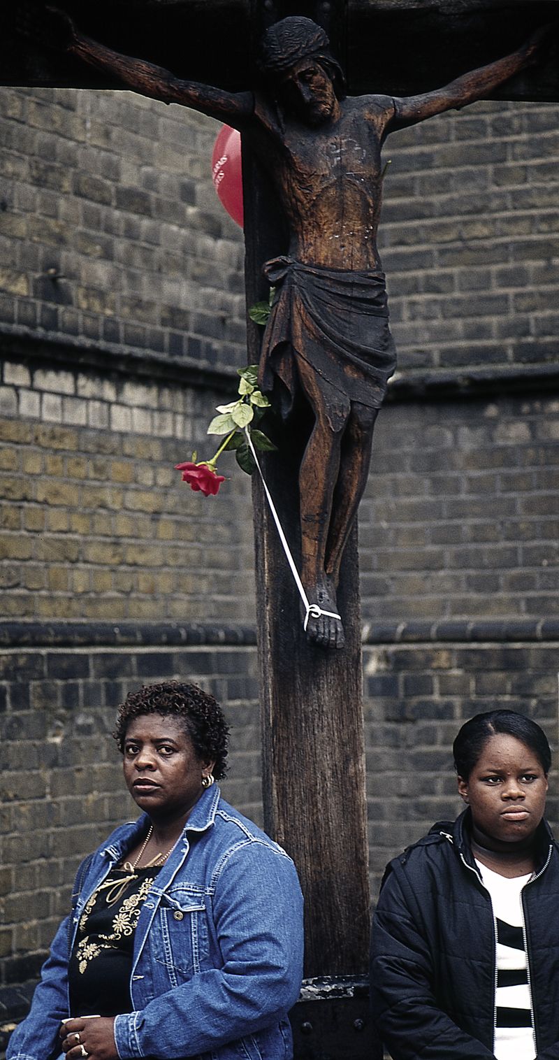 © John Perivolaris - Mother, Daughter, and Crucifixion, Notting Hill, London, 2002.