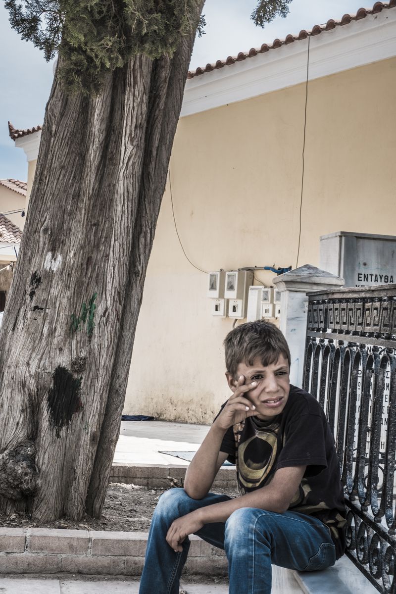 © John Perivolaris - Refugee Boy, Island of Chios, Greece, 2016.