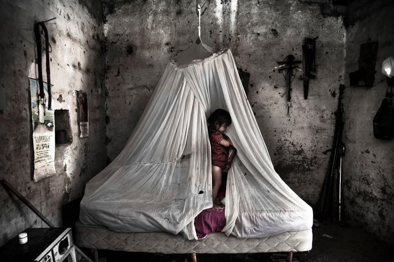 © Yael Martínez - The dark root. Itzel Martinez playing at her grandparents home in the comunity of Santiago Temixco, Guerrero Mexico