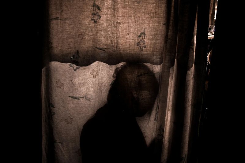 © Yael Martínez - Shadow of Sandra Granda at home in Taxco Guerrero Mexico. In 2013 three of my brother in-law died.