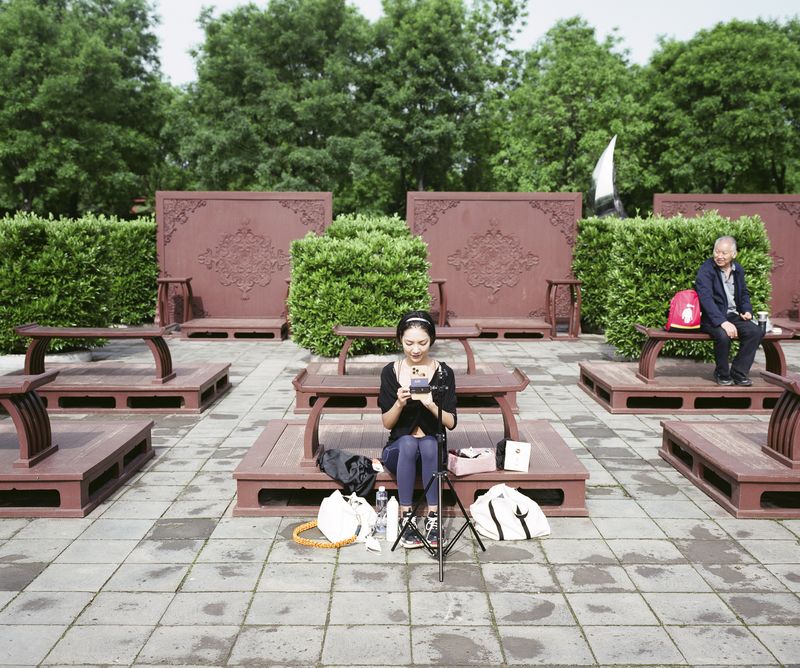 © Pan Wang - A girl doing live broadcasting in Daming Palace Ruins Park