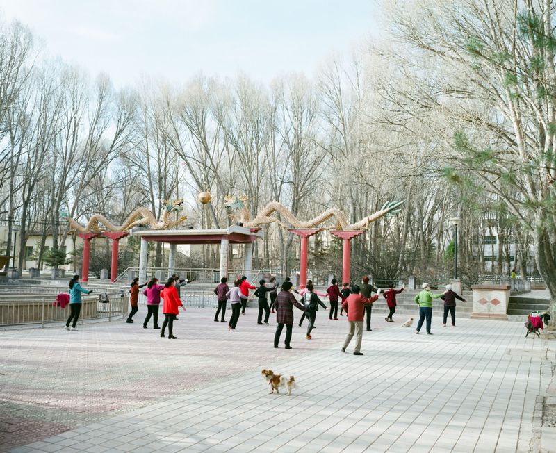 © Pan Wang - April 15, 2018，Yumen City, Gansu Province, China. In the morning of the oilfield park, women are aerobics.