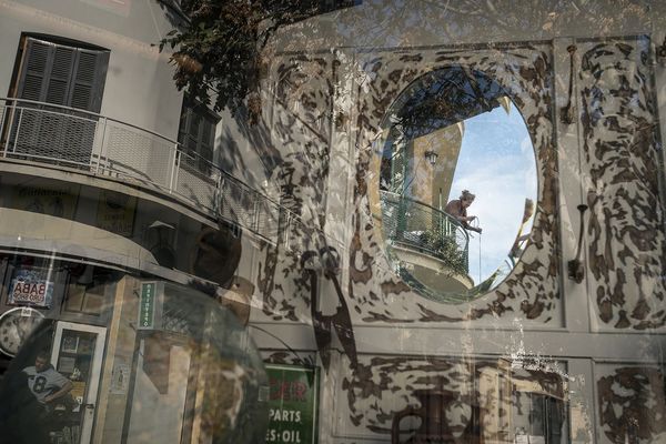 © Sahan Nuhoglu - An old Greek Cypriot woman is reflected on a retro decoration shop window based in Nicosia, Cyprus.