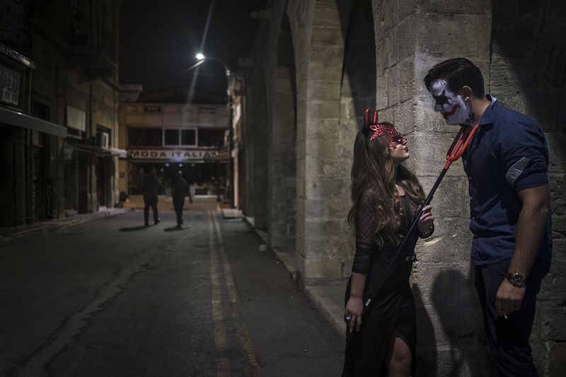© Sahan Nuhoglu - A Turkish Cypriot couple is pictured at a Halloween party held in front of Buyuk Khan, north Nicosia.