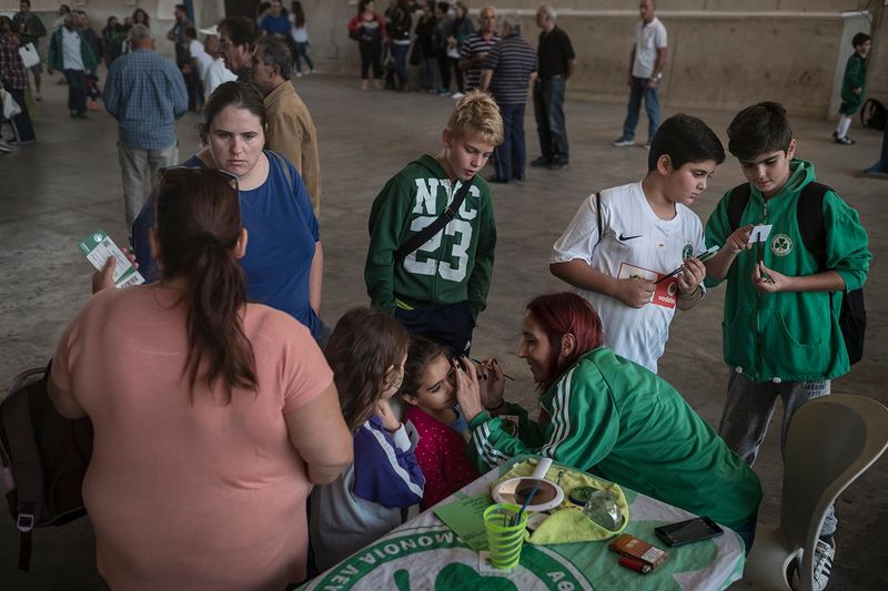 © Sahan Nuhoglu - AC Omonoia supporters are getting prepared before a home game against Aris, another Nicosian football team.
