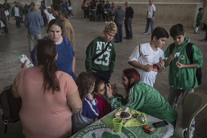 © Sahan Nuhoglu - AC Omonoia supporters are getting prepared before a home game against Aris, another Nicosian football team.