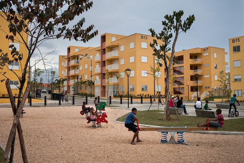 © Benjamin Petit - Children play in one of the playground built in La Nueva Barquita. Santo Domingo, Dominican Republic. July 5, 2016.