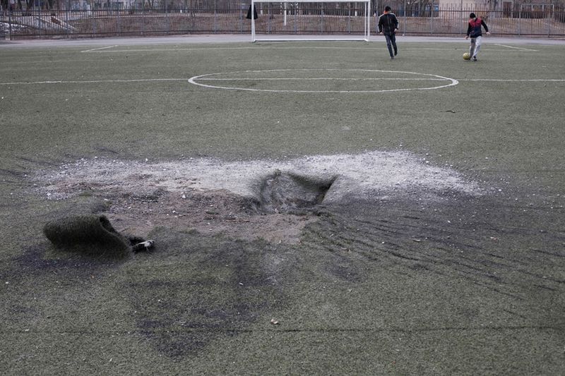 © Marek M. Berezowski - Vastochnyj district, after shelling. by „Grad” rockets. More than 20 people were killed. Mariupol. Ukraine side. 2015