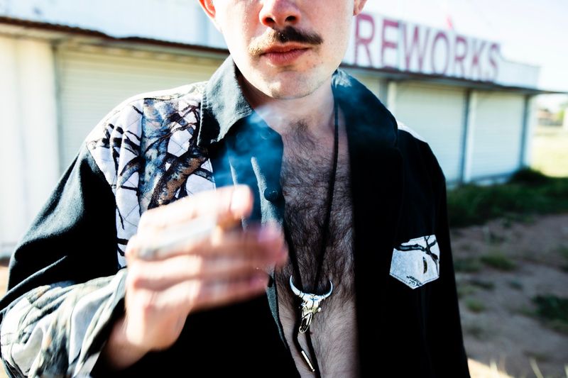 © William Hohe - Cigarette break in Gallup, New Mexico.