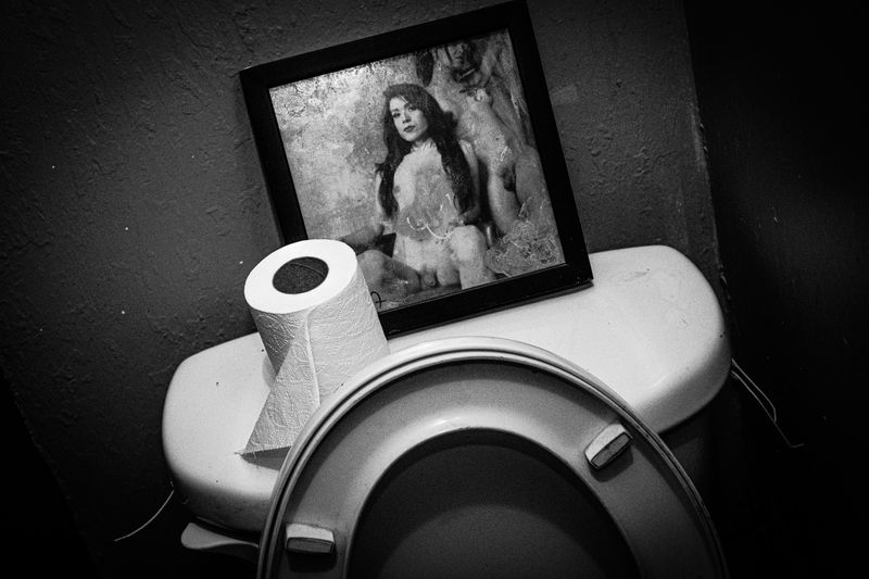 © Rafael Fabrés - Portrait of a transgender woman on a toilet in a bar in the City of Mexico, Mexico. (Photo by Rafael Fabrés)
