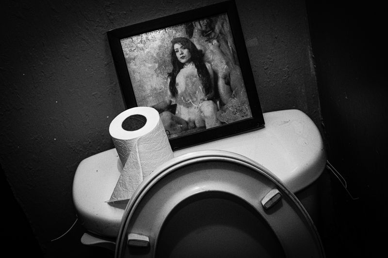 © Rafael Fabrés - Portrait of a transgender woman on a toilet in a bar in the City of Mexico, Mexico. (Photo by Rafael Fabrés)