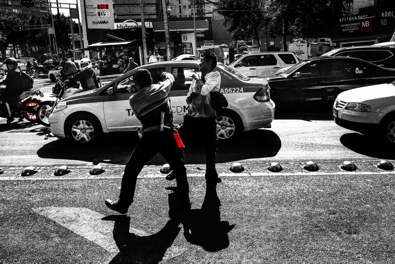 © Rafael Fabrés - Two car window washers get into a fight in the City of Mexico, Mexico.(Photo by Rafael Fabrés)