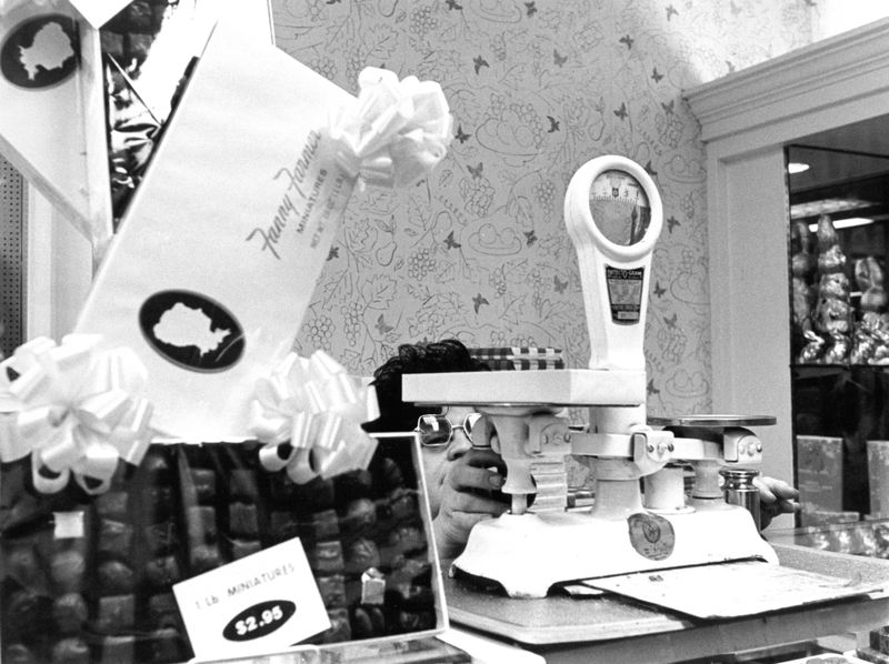 © Diana Mara Henry - Worker at the Fanny Farmer store, Port Authority Bus Terminal, NYC.