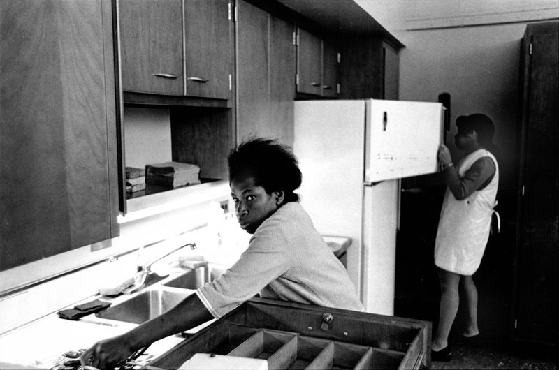 © Diana Mara Henry - Two girls in model kitchen at vocational school, Brooklyn.