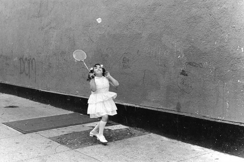 © Diana Mara Henry - Playing badminton in a fancy dress, Red Hook, Brooklyn.