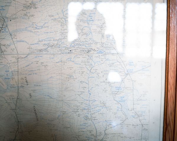 © Fernanda Soto Mastrantonio - Self-portrait facing the unknown, the map as a symbol of the identity and the journey.