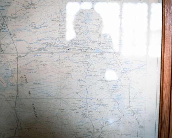 © Fernanda Soto Mastrantonio - Self-portrait facing the unknown, the map as a symbol of the identity and the journey.