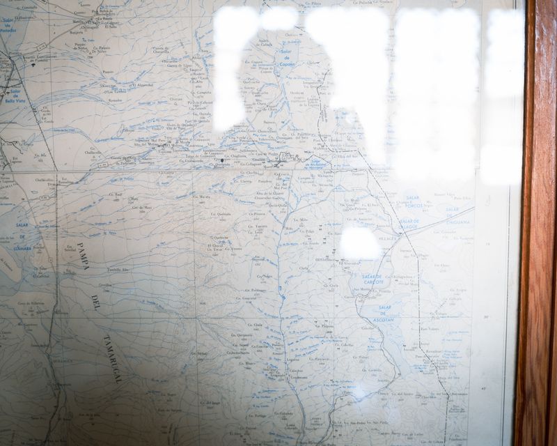 © Fernanda Soto Mastrantonio - Self-portrait facing the unknown, the map as a symbol of the identity and the journey.