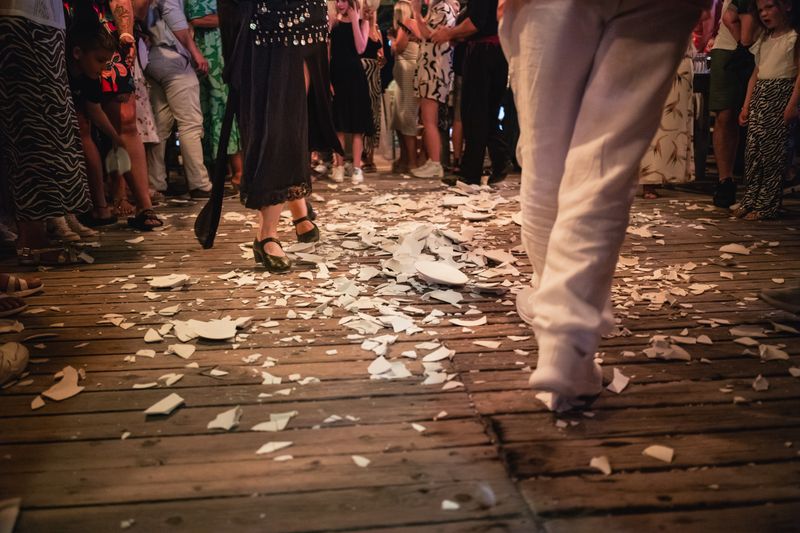 © Christopher Jones - Plate smashingSidari, Corfu.A couple dances as broken plates cover the floor of a taverna.