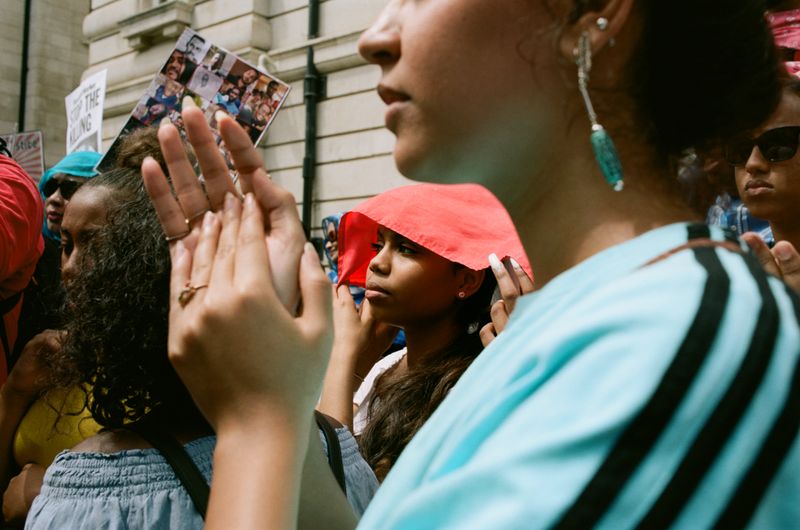 © Zora Kuettner - Girl under red glag