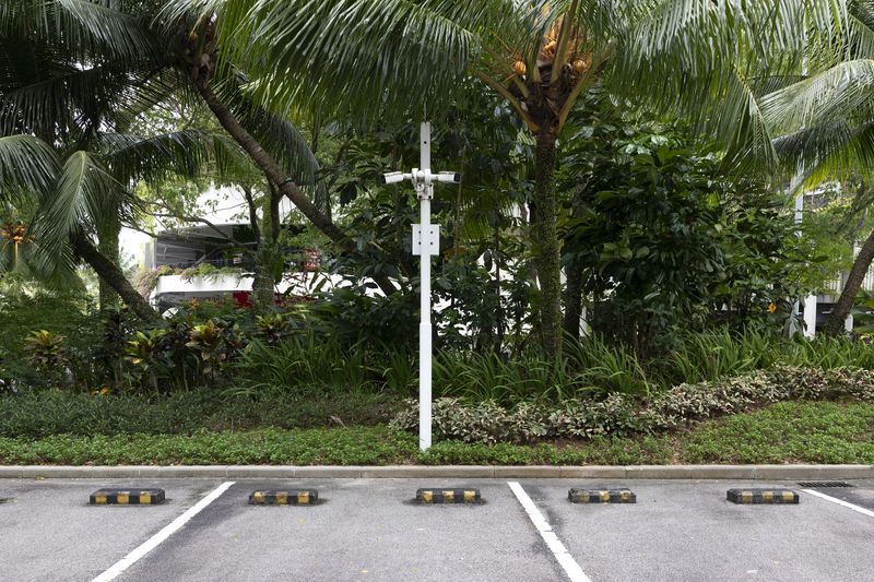 © Francesca Pompei - Security cameras in a deserted parking of a local building.