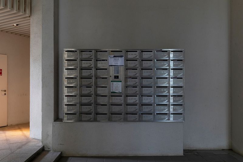 © Francesca Pompei - Empty postboxes inside a condominium.
