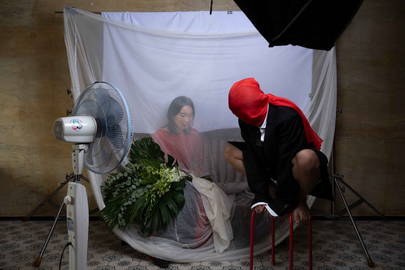 © Ben-Bùi Nguyễn - Matrimony Unveiled: Personifying Maternal Presence in My Parents' Wedding Rite.