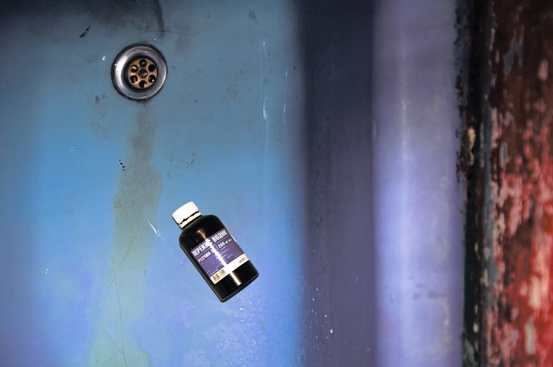© Yulia Kozynka - "Disinfection" | An empty bottle of hydrogen peroxide used to clean the cut