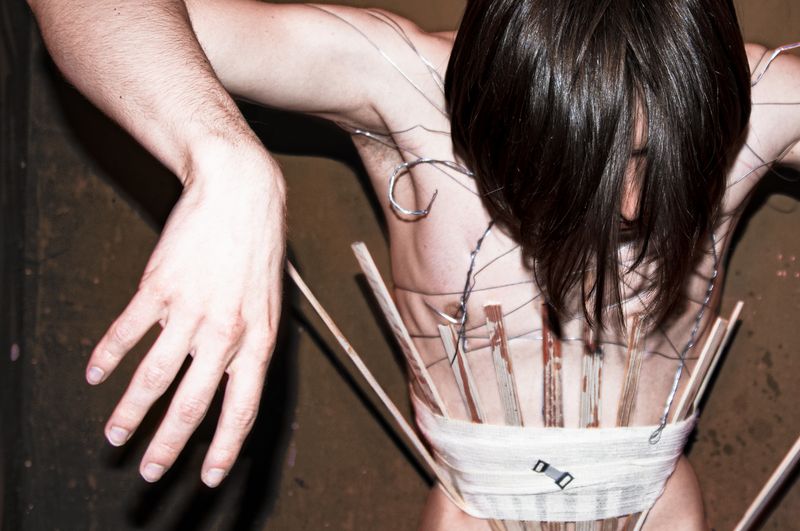 © Yulia Kozynka - "Brace" | An artificial support and discipline holding the body together