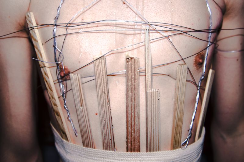© Yulia Kozynka - "Frame" | A frame made from wire, an elastic bandage, and a skin glue
