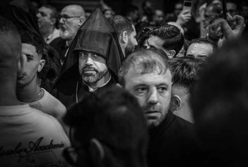 © Zeev Kurlianchick - Through ritual, separate communities stand side by side amid the crowd, like islands in an archipelago, keeping the peace.