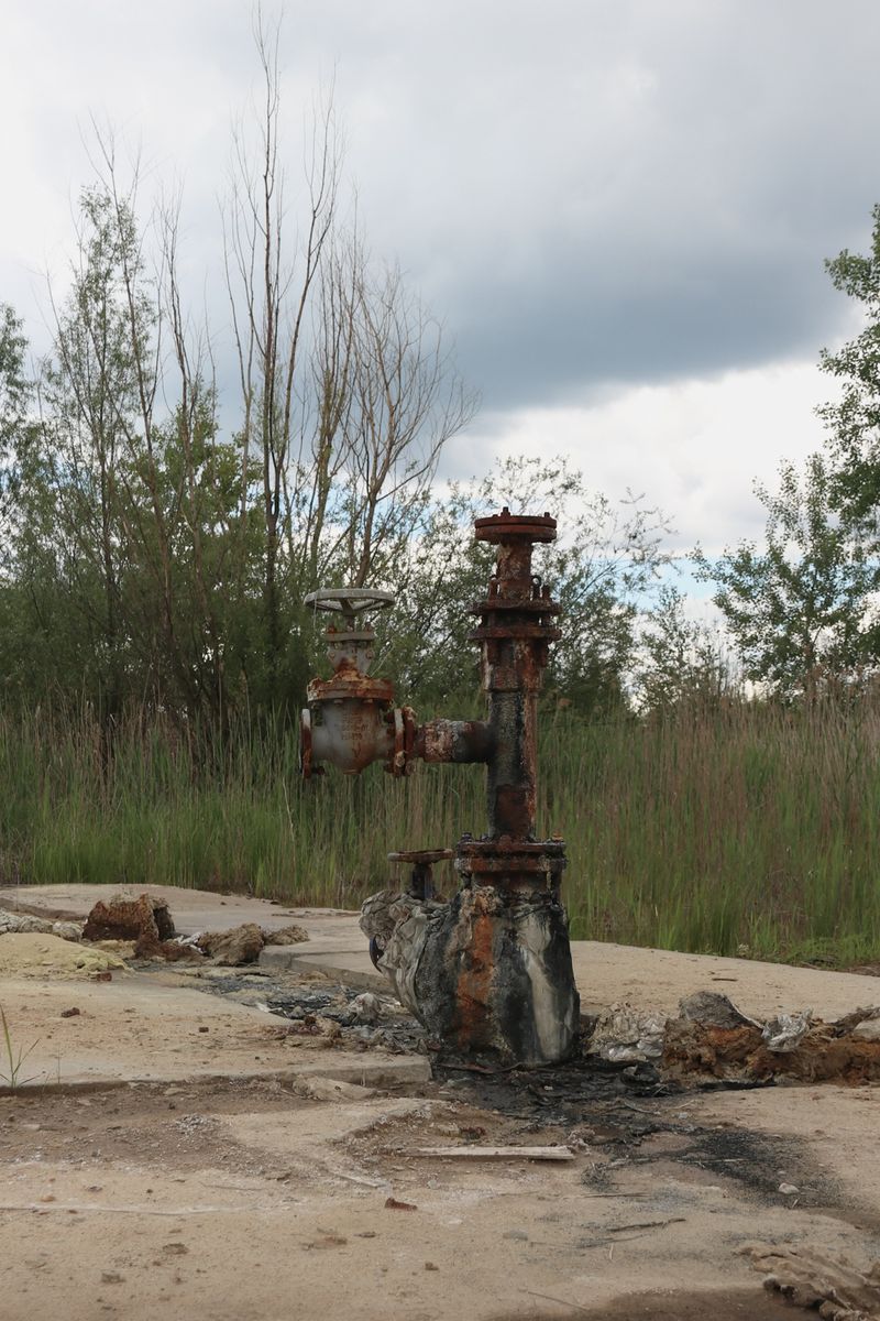 © Angelika Gad - Sulfur mine infrastructure on the former site of a village displaced for mining operations.