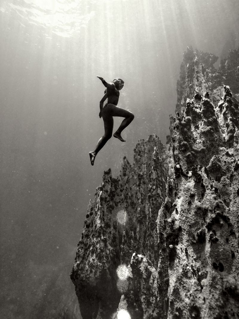 © Maddison Woollard - Unworldly | Sculpted by ancient lava, a limestone staircase rises from its lake depths back to where it all began