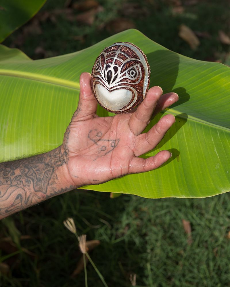© Shannon - Keoki’s I’O (Hawaiian Hawk) Carving on an Opihi (Limpet) Shell, Kaunakakai, 2018, 40 x 32 inches, archival inkjet print