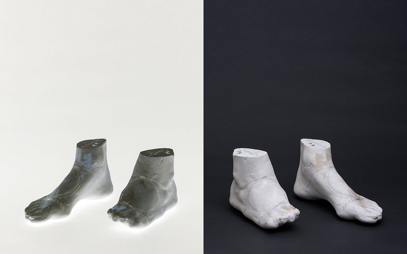 © Shannon Benine - Former Patient’s Foot Molds No. 2, Kalaupapa Museum, 2016, 25 x 40 inches, archival inkjet print